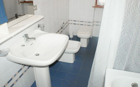 Magnolia: Bathroom, Toilet, Property, Bathroom Sink, Toilet Seat, Room, Plumbing Fixture, Tap, Sink, Tile