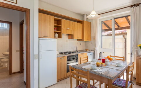 Francesca: Property, Furniture, Room, Building, Kitchen, Interior Design, Countertop, Cabinetry, Yellow, House
