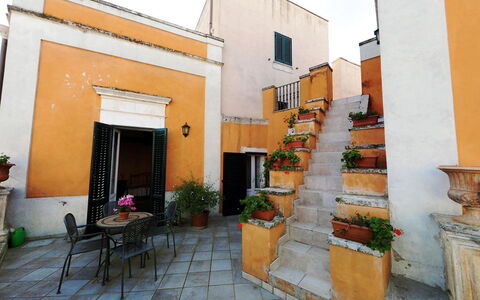 Carovigno: Property, Yellow, House, Building, Neighbourhood, Real Estate, Architecture, Room, Home, Facade