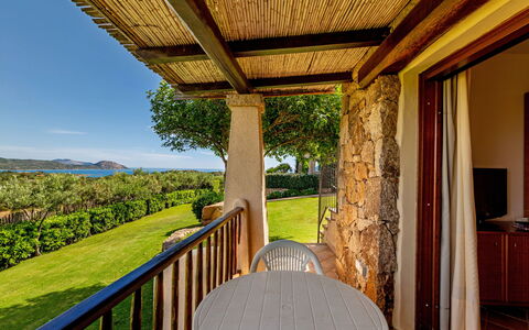 Porto San Paolo 200: Plant, Furniture, Sky, Green, Shade, Wood, Interior Design, Tree, Building, Porch