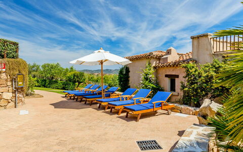 Porto San Paolo 200: Cloud, Sky, Plant, Building, Azure, Arecales, Outdoor Furniture, Shade, Umbrella, Leisure