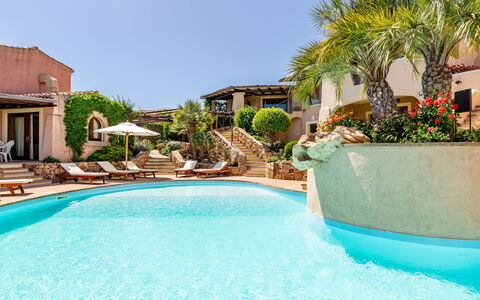 Porto San Paolo 200: Water, Plant, Daytime, Sky, Swimming Pool, Azure, Tree, Building, Leisure, Composite Material