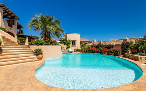 Porto San Paolo 200: Water, Sky, Plant, Building, Swimming Pool, Azure, Tree, Leisure, Shade, Aqua