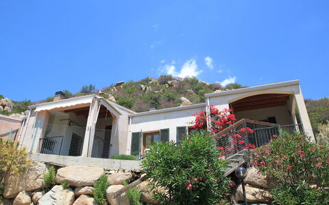Costa Rei 100: Sky, Plant, Property, Window, Building, Flower, Cloud, House, Residential Area
