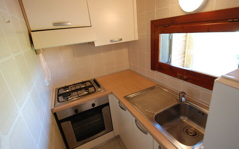 Costa Rei 150: Property, Tap, Sink, Building, Window, Kitchen Sink, Plumbing Fixture, Cabinetry, Wood, Kitchen