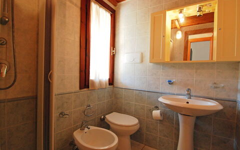 Costa Rei 150: Brown, Mirror, Plumbing Fixture, Tap, Sink, Property, Bathroom Sink, Bathroom, Purple, Wood