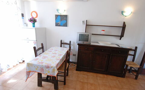 Costa Rei 180: Furniture, Property, Cabinetry, Table, Picture Frame, Drawer, Desk, Wood, Living Room, Interior Design