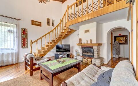 Bierna: Furniture, Couch, Property, Table, Wood, Comfort, Interior Design, Chair, Floor, Stairs