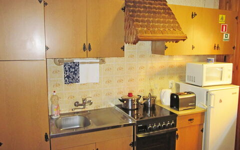 Mały Domek: Property, Room, Kitchen, Yellow, Cabinetry, Furniture, House, Kitchen Stove, Major Appliance, Building