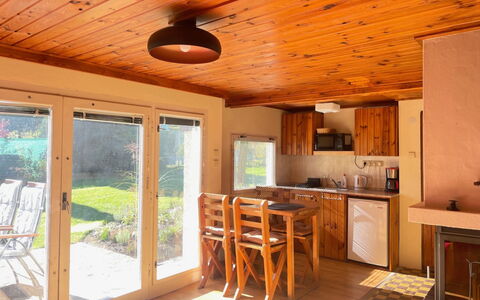 Zhorska: Property, Table, Plant, Wood, Cabinetry, Countertop, Lighting, Interior Design, Window, Chair