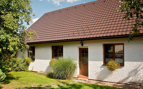 Chrastov: Plant, Building, Property, Window, Cloud, Sky, House, Land Lot, Vegetation