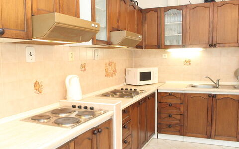 Karlovka: Countertop, Property, Room, Kitchen, Cabinetry, Furniture, Sink, Building, Floor, House