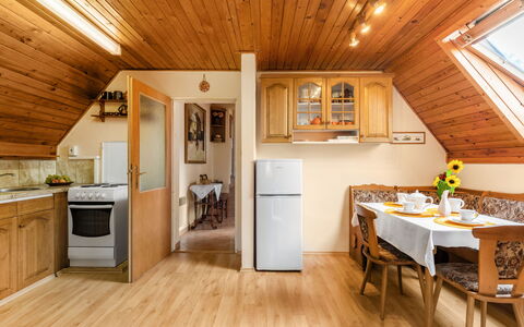 Horní Věstonice: Property, Furniture, Countertop, Cabinetry, Table, Picture Frame, Wood, Kitchen, Lighting, Kitchen Appliance