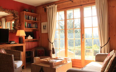 Armorial Ii Apt 2 850.1: Property, Furniture, Window, Table, Wood, Building, Shade, Living Room, Lighting, Orange