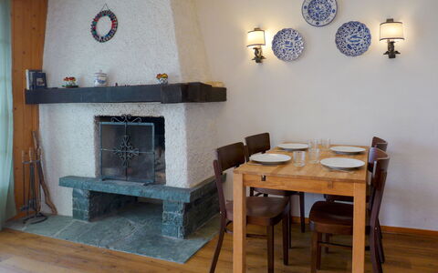 Villars 995: Table, Property, Blue, Wood, Interior Design, Living Room, Hearth, Clock, Floor, Wall