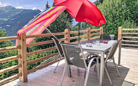 Château Lapin: Umbrella, Outdoor Furniture, Shade, Outdoor Table, Balcony, Awning, Chair, Deck, Houseplant, Outdoor Structure