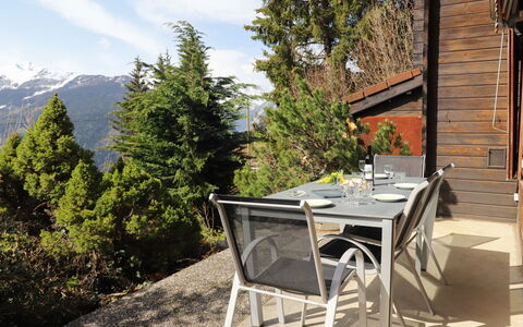 Château Lapin: Plant, Cloud, Table, Building, Sky, Tree, Mountain, Outdoor Furniture, Outdoor Table, Wood