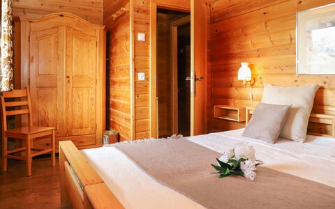 Château Lapin: Furniture, Building, Property, Comfort, Wood, Orange, Bed Frame, Floor, Pillow, Real Estate