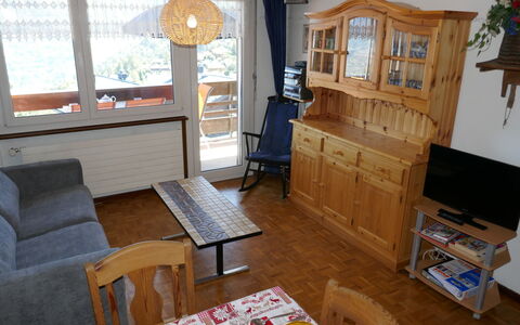 Nendaz 100: Furniture, Table, Property, Couch, Cabinetry, Wood, Interior Design, Television, Living Room, Flooring