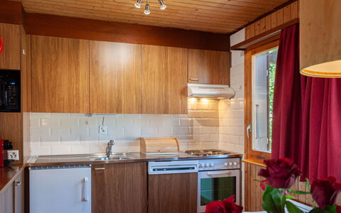 Le Hibou: Cabinetry, Property, Building, Countertop, Flower, Wood, Sink, Window, Lighting, Kitchen