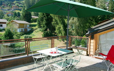 Nendaz 200: Umbrella, Patio, Property, Shade, Table, Furniture, Backyard, Yard, Building, House