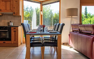 Nendaz 220: Property, Furniture, Cabinetry, Table, Countertop, Wood, Chair, Plant, Lighting, Interior Design
