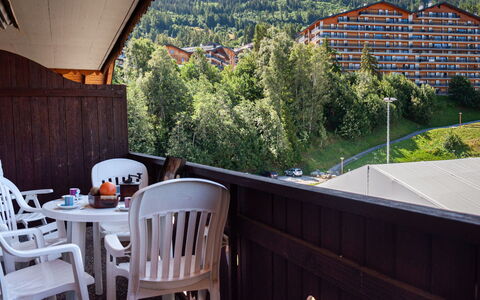 Nendaz 340: Table, Furniture, Property, Building, Chair, Plant, Sky, Shade, Lighting, Wood