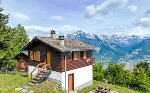 Hildegarde: Cloud, Sky, Plant, Building, Mountain, Natural Landscape, Window, Tree, Wood, House