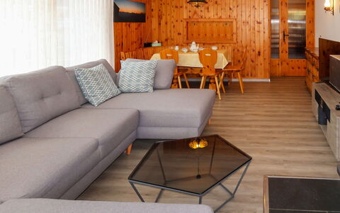 Nendaz 600: Table, Furniture, Property, Couch, Interior Design, Lighting, Wood, Architecture, Studio Couch, Floor