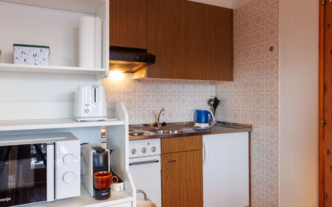 Jolimont J4: Kitchen, Kitchen Appliance, Major Appliance, Countertop, Wood, Interior Design, Cabinetry, Furniture, Sink, Room