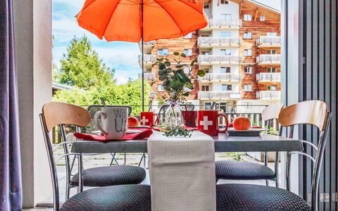 Nendaz 830: Sky, Building, Plant, Table, Shade, Interior Design, Urban Design, Tree, Condominium, Residential Area