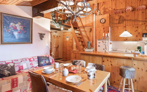 Nendaz 880: Property, Sky, Table, Wood, Shade, Floor, Outdoor Furniture, Chair, Flooring, Wood Stain