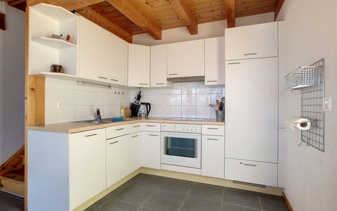 Au Bisse: Cabinetry, Countertop, Property, Furniture, Kitchen Appliance, Kitchen Stove, Kitchen, Building, Wood, Home Appliance