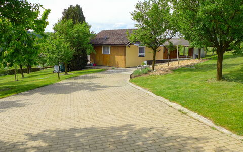 Hügli: Plant, Building, Sky, Property, Tree, Window, Cloud, House, Road Surface, Land Lot