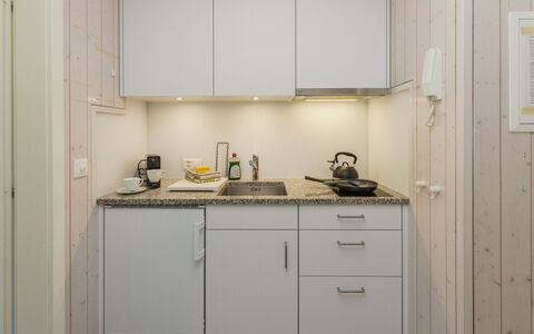 Schönried 200: Kitchen, Countertop, Wood, Interior Design, Sink, Kitchen Appliance, Plumbing Fixture, Major Appliance, Flooring, Cabinetry