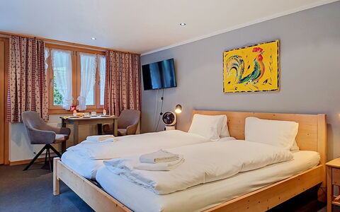 Grindelwald 150: Bed, Bedroom, Wall, Bed Sheet, Interior Design, Bedding, Wood, Textile, Bed Frame, Furniture