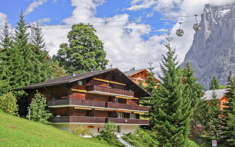 Chalet Bodmisunne: Cloud, Plant, Sky, Building, Mountain, Window, Natural Landscape, Tree, Highland, House