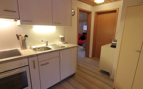 Chalet Doris: Sink, Kitchen Sink, Tap, Cabinetry, Countertop, Wood, Plumbing Fixture, Building, Interior Design, Lighting