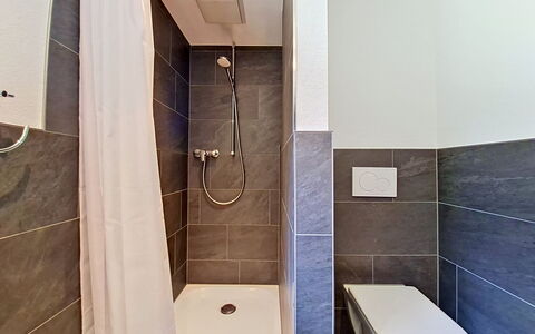 Egg-Isch: Flooring, Plumbing Fixture, Floor, Bathroom, Toilet, Plumbing, Tile, Composite Material, Toilet Seat