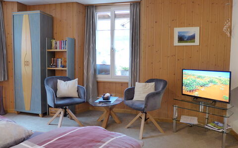Rösli: Furniture, Property, Building, Window, Wood, Table, Shade, Comfort, Interior Design, Flooring