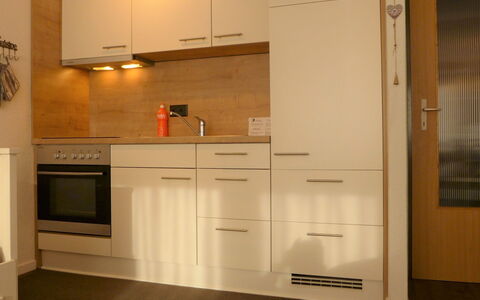 Select: Cabinetry, Countertop, Building, Wood, Lighting, Interior Design, Kitchen Appliance, Kitchen, Kitchen Stove, House