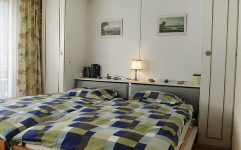 Milihaus a: Bedroom, Bed, Furniture, Room, Property, Bed Sheet, Bed Frame, Bedding, Wall, Interior Design
