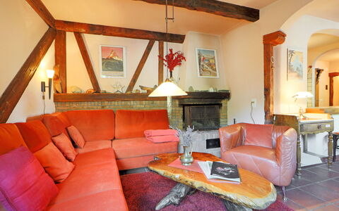 Bodmen a: Furniture, Property, Couch, Comfort, Picture Frame, Building, Orange, Table, Studio Couch, Wood