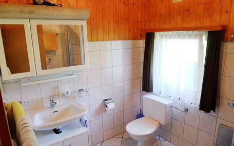 Christl: Bathroom, Room, Property, Sink, Tile, Floor, Bathroom Cabinet, Furniture, Bathroom Sink, Building