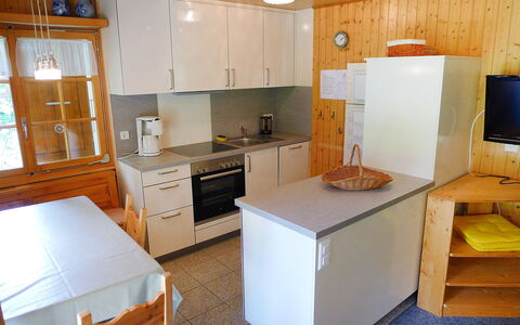 Allegra: Countertop, Room, Kitchen, Cabinetry, Property, Furniture, Major Appliance, Building, Kitchen Stove, Refrigerator
