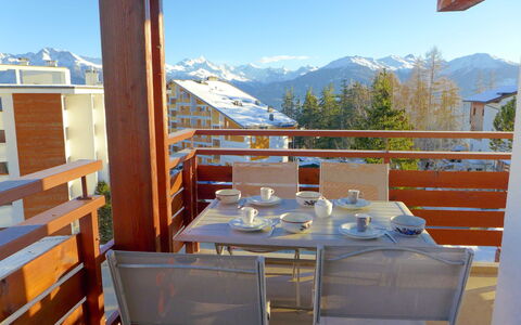 Crans-Montana 120: Sky, Property, Mountain, Furniture, Table, Light, Building, Wood, Shade, Architecture