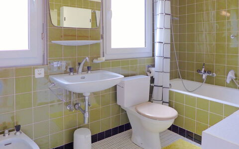 Crans-Montana 155: Bathroom, Property, Room, Tile, Bathroom Accessory, Wall, Tap, Plumbing Fixture, Interior Design, Purple