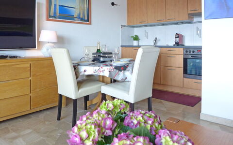Crans-Montana 155: Flower, Furniture, Property, Cabinetry, Table, Blue, Plant, Interior Design, Lighting, Drawer