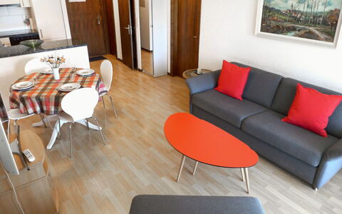 Crans-Montana 290: Table, Furniture, Comfort, Picture Frame, Wood, Living Room, Orange, Door, Flooring, Interior Design