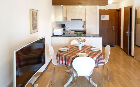 Crans-Montana 290: Furniture, Cabinetry, Table, Wood, Kitchen, Comfort, Living Room, Flooring, Chair, Interior Design